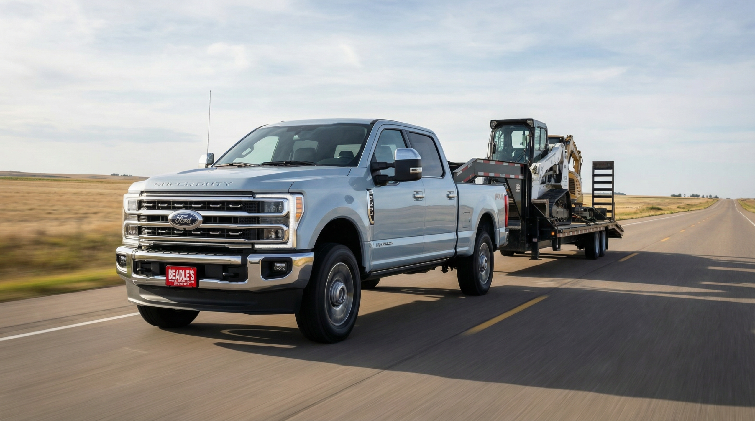Ford F-350 towing on the highway for engine comparison