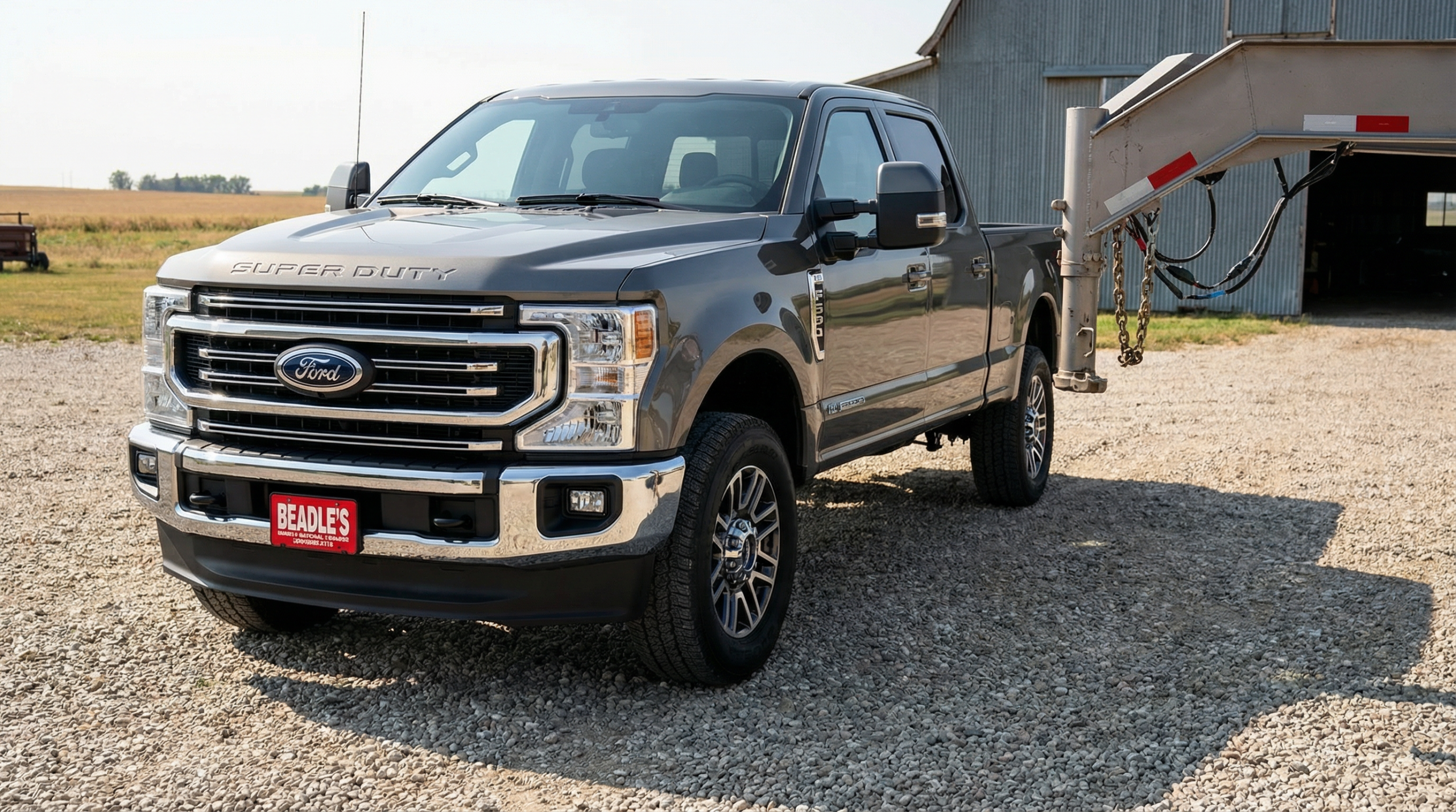 Ford F-350 trailer hitch setup on a rural lot