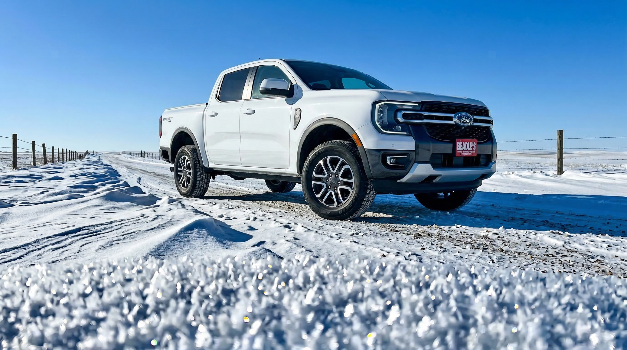 2026 Ford Ranger Lariat driving through snowy South Dakota prairie landscape